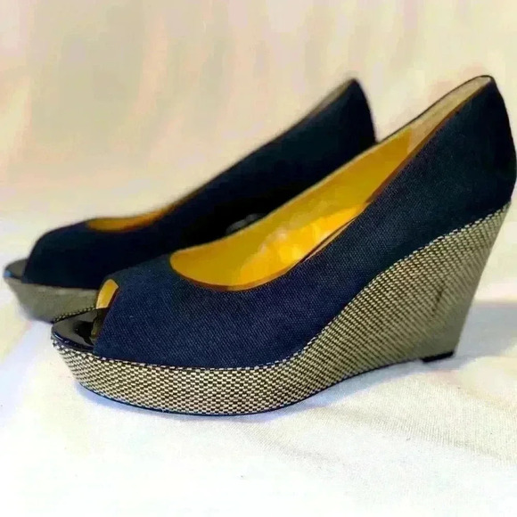Nine West | Cheerful | Platform Wedge |
Navy Blue Canvas | Peep Toe - Picture 3 of 5